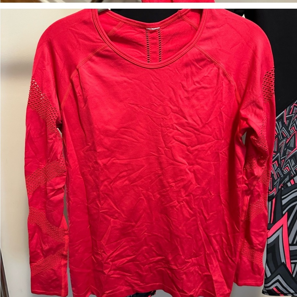 Red long sleeved athletic shirt